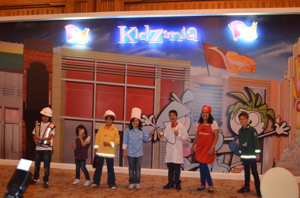 Kids wearing different outfits entertained guests.