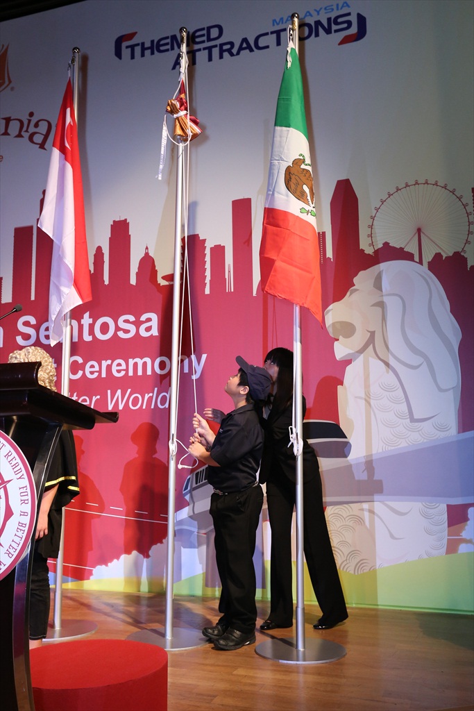 Raising of the KidZania flag to join the flags of Singapore and Mexico